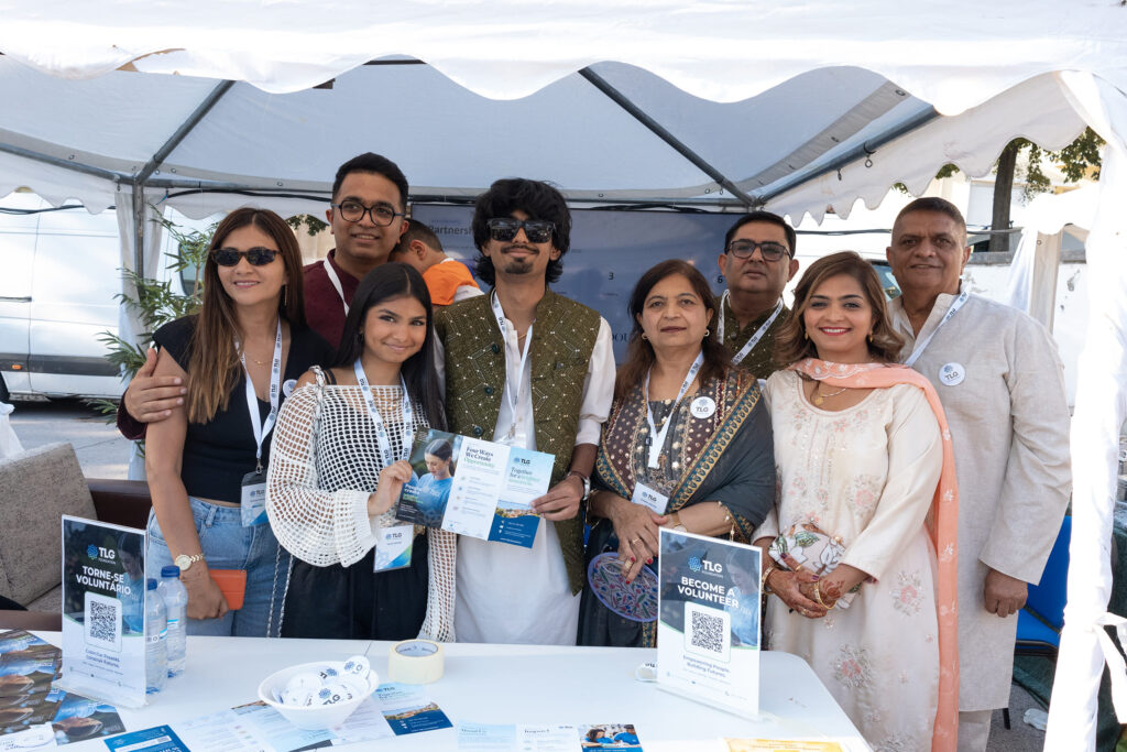 TLG Foundation team and partners posing together at the Partnerships showcase during Festival Gandhi 2026