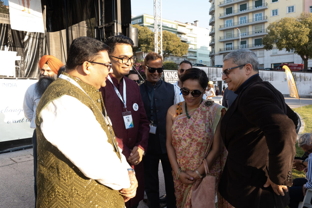 TLG Foundation representatives in conversation with guests near the festival grounds at Festival Gandhi 2026